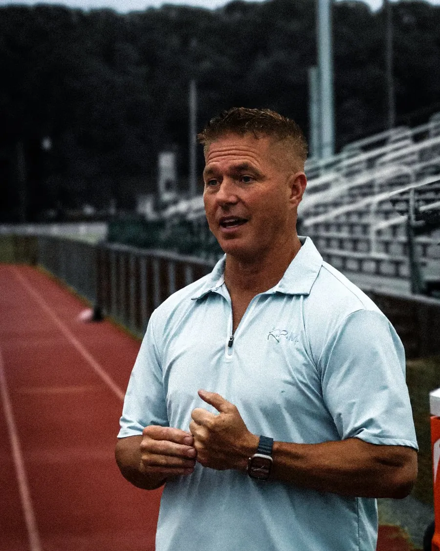David Klemic coaching trackside
